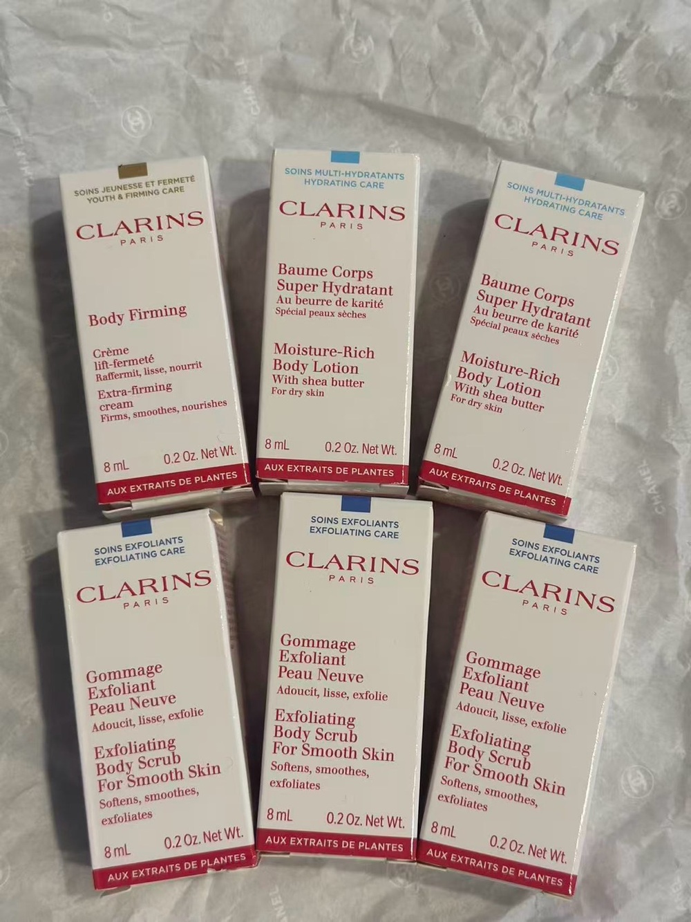 Clarins White and Red Mini Body Lotion & Exfoliating Scrub Set